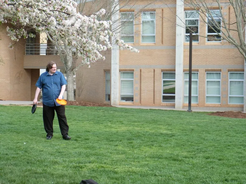 Computer Science Faculty Member in the Quad.